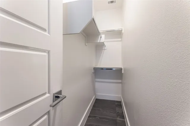 a bathroom with a washer and dryer