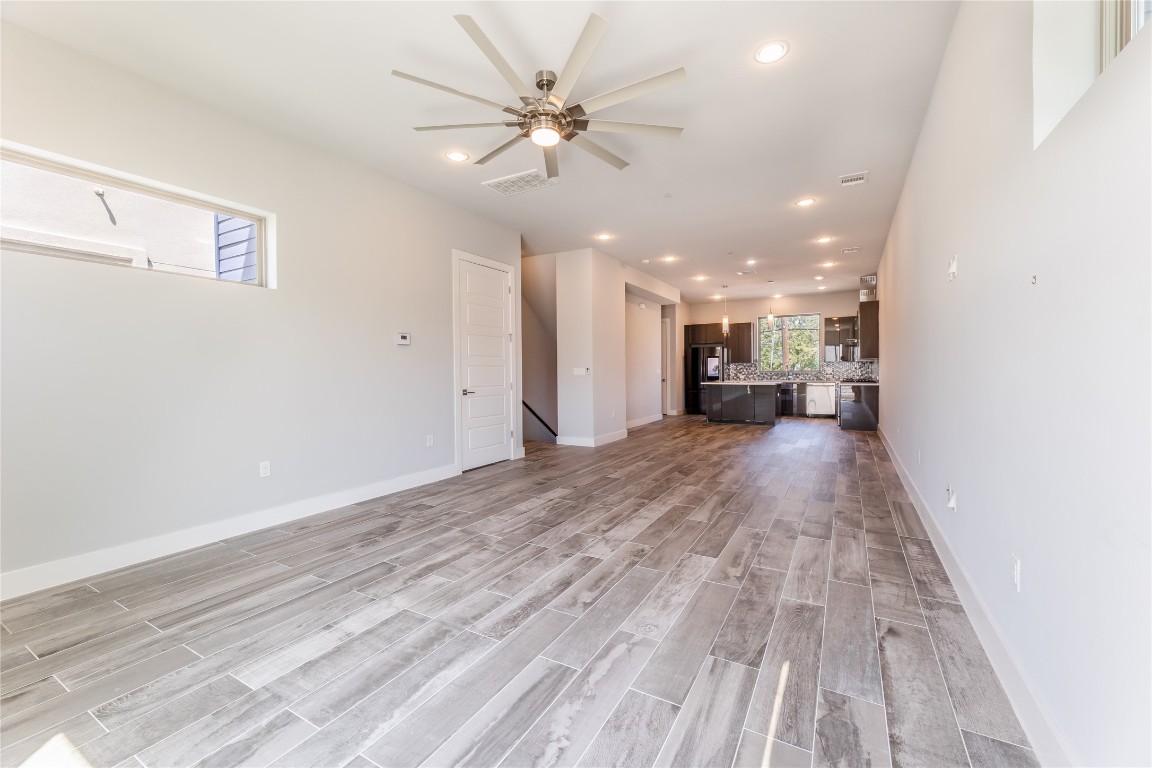 1417 Kramer Lane, Unit 9 Austin, TX 78758 - Photo 23 of 40 a view of a hallway with a window