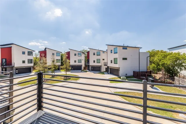 a view of a living room and kitchen view