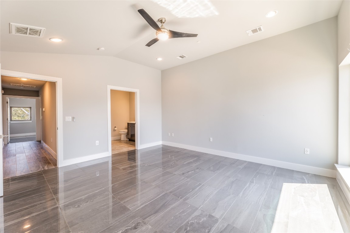 1417 Kramer Lane, Unit 9 Austin, TX 78758 - Photo 30 of 40 wooden floor in an empty room with a window