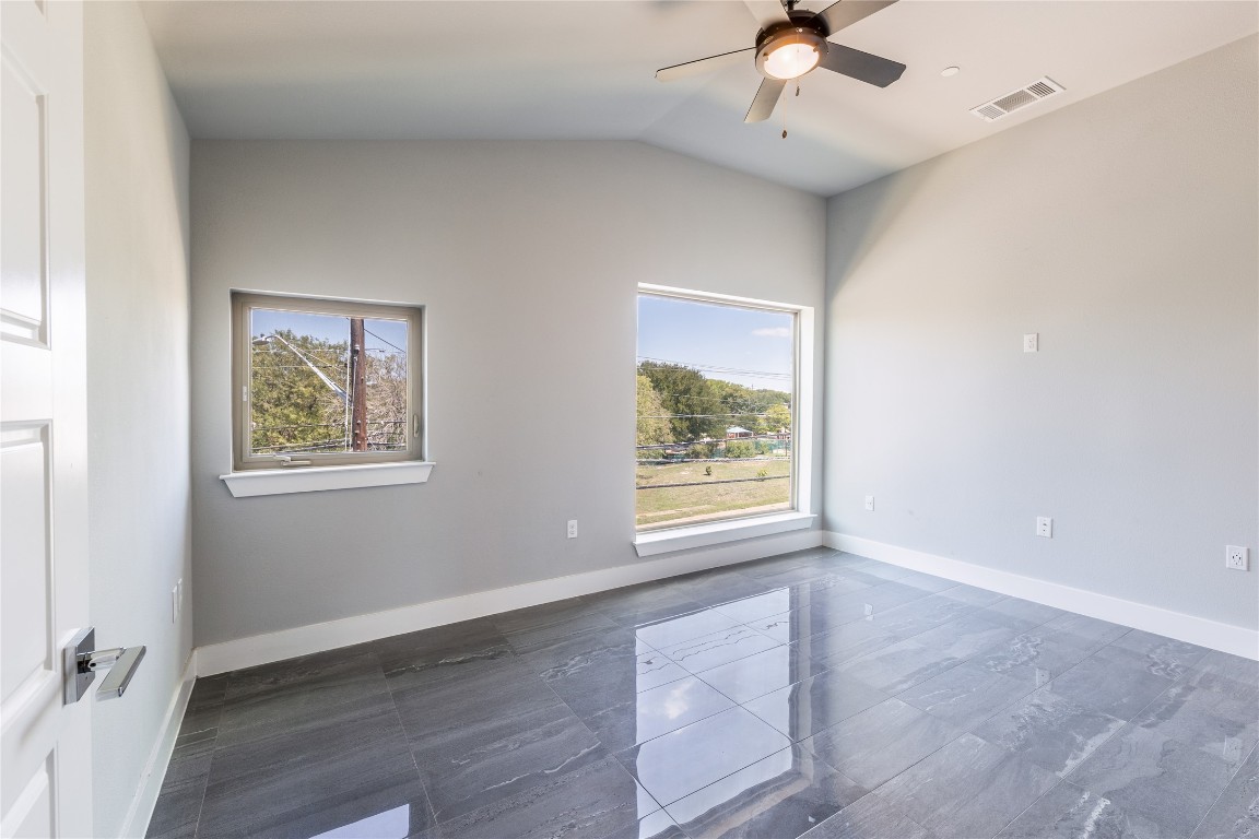 1417 Kramer Lane, Unit 9 Austin, TX 78758 - Photo 35 of 40 a view of an empty room with a window