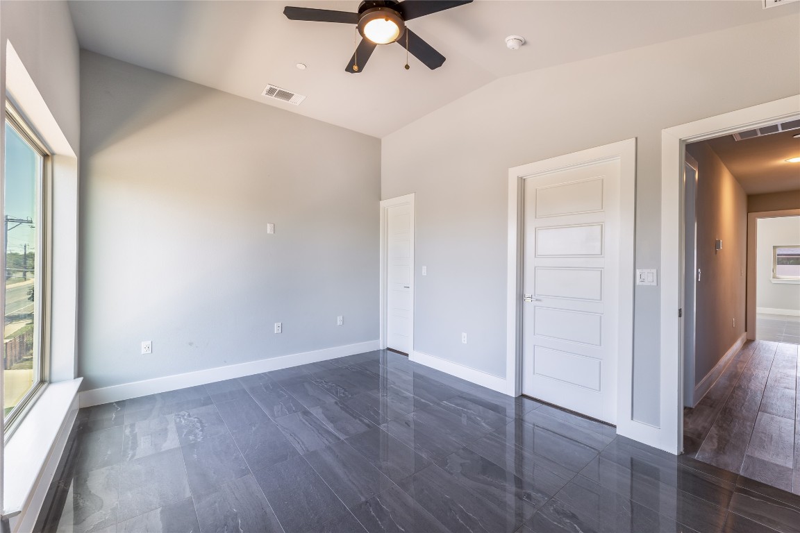1417 Kramer Lane, Unit 9 Austin, TX 78758 - Photo 36 of 40 wooden floor in an empty room with a window