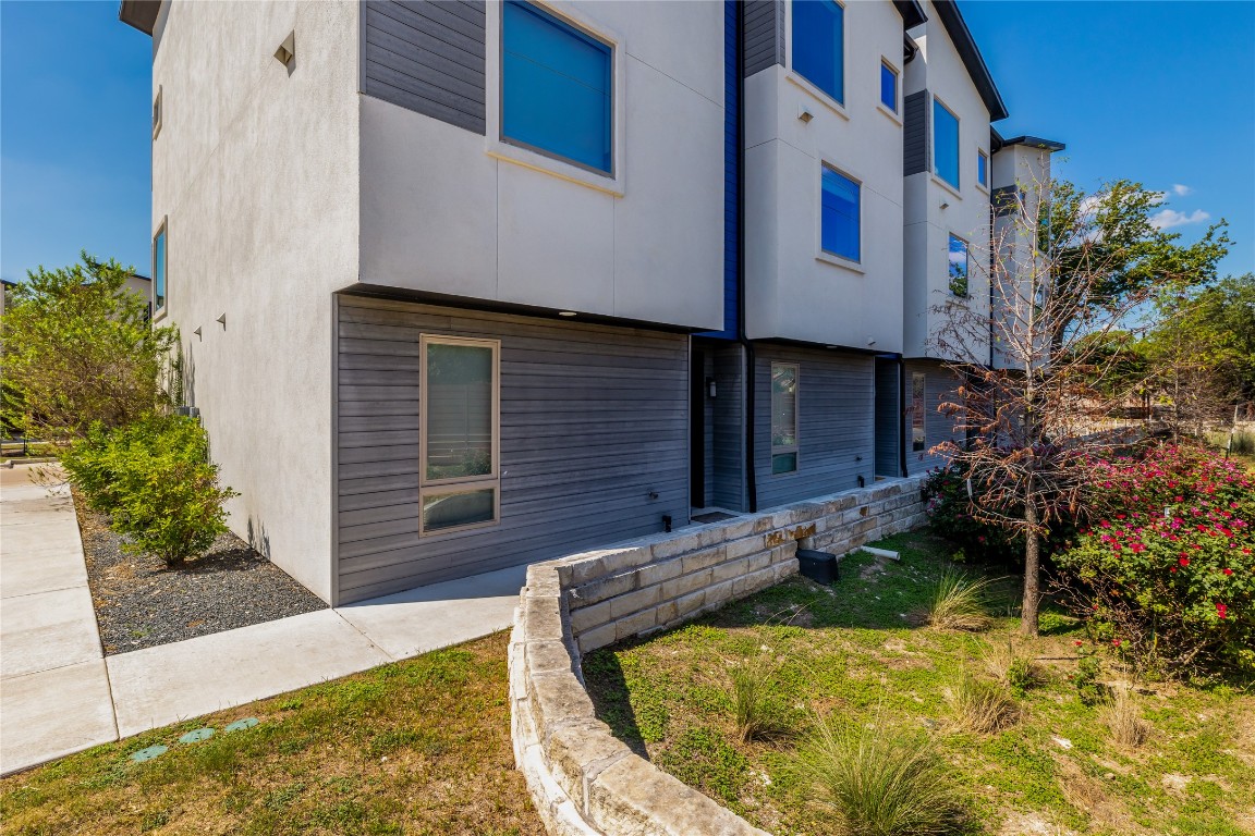 1417 Kramer Lane, Unit 9 Austin, TX 78758 - Photo 5 of 40 a view of a house with backyard