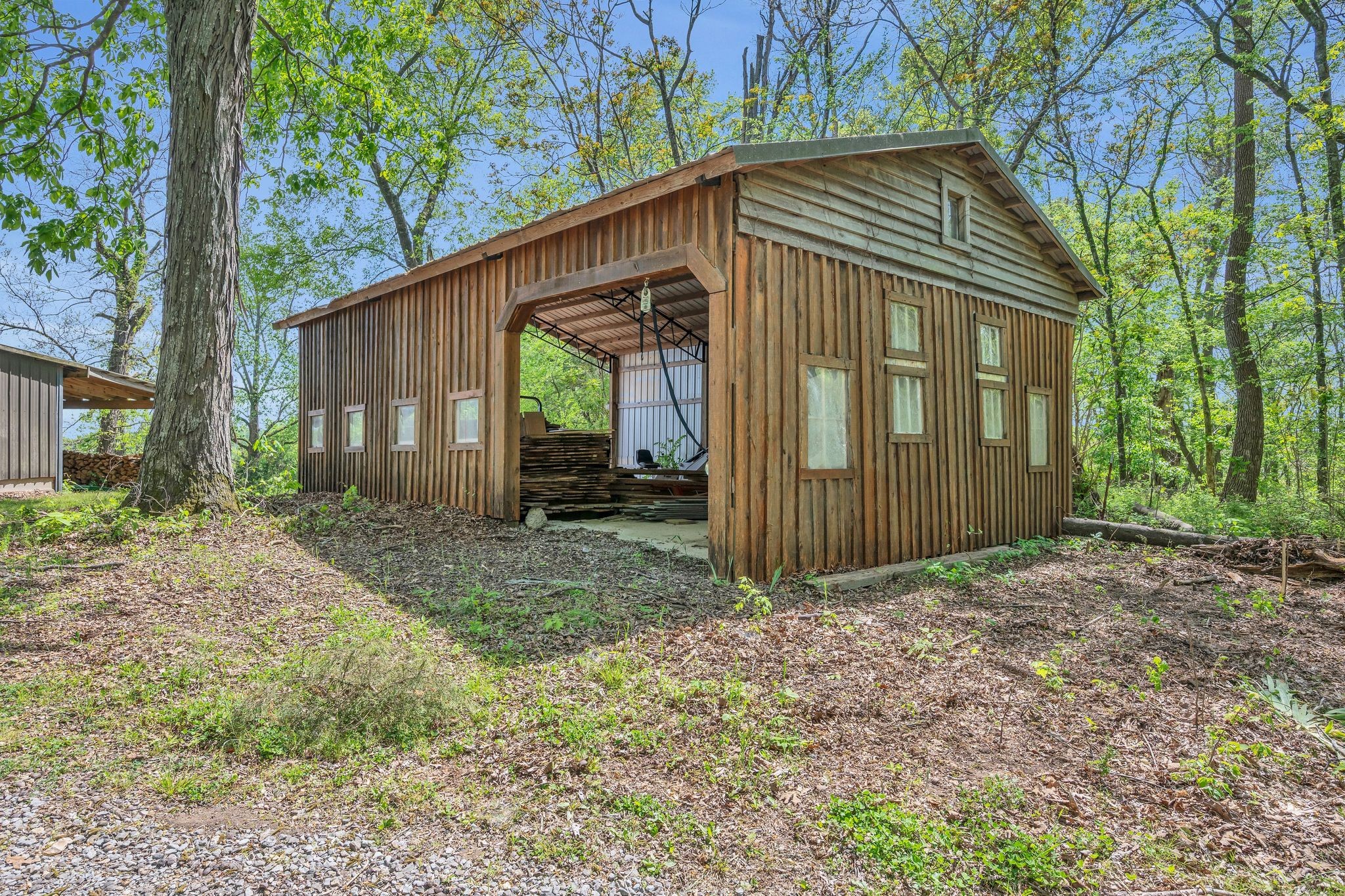 39 Fayetteville Road Kelso, TN 37348 - Photo 63 of 75 a view of a small house with a yard