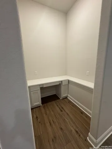 a view of an empty walk in closet
