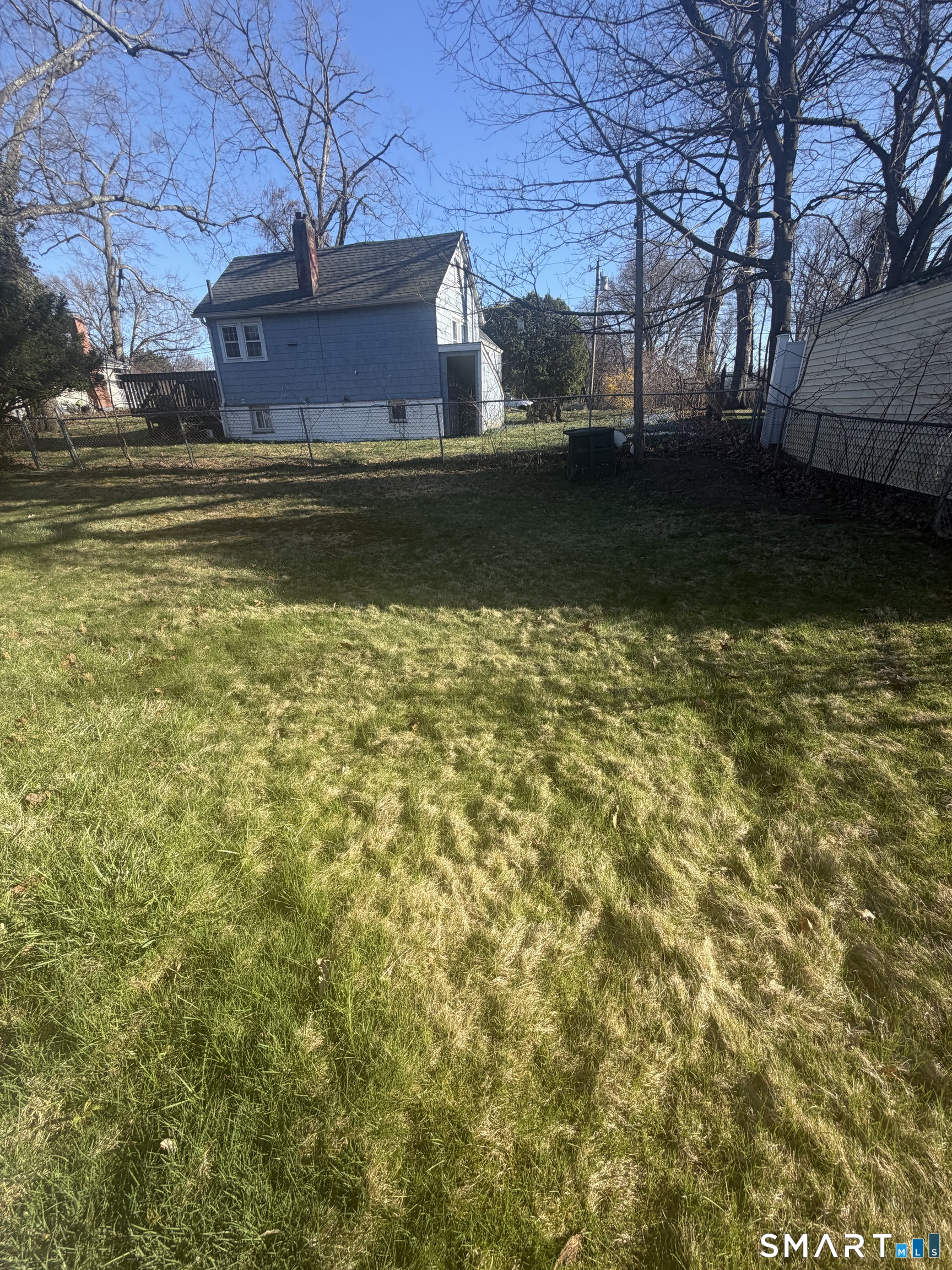 75 Elizabeth Avenue Bloomfield, CT 06002 - Photo 15 of 17 a view of a house with a yard