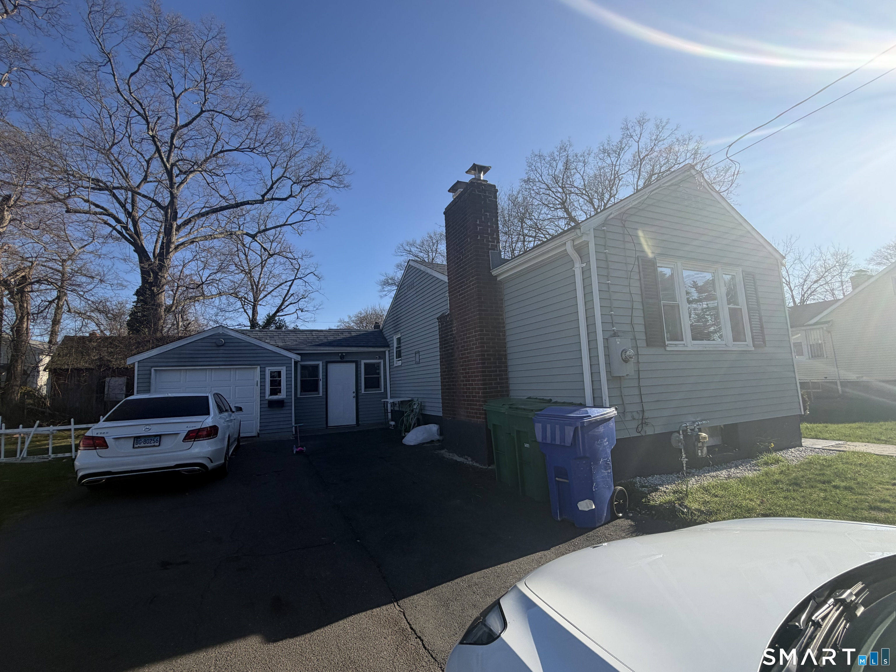 75 Elizabeth Avenue Bloomfield, CT 06002 - Photo 17 of 17 front view of a house with a yard