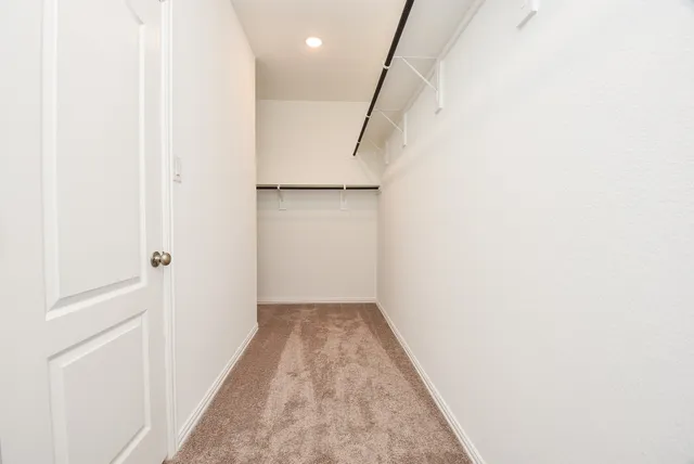 a view of hallway with stairs