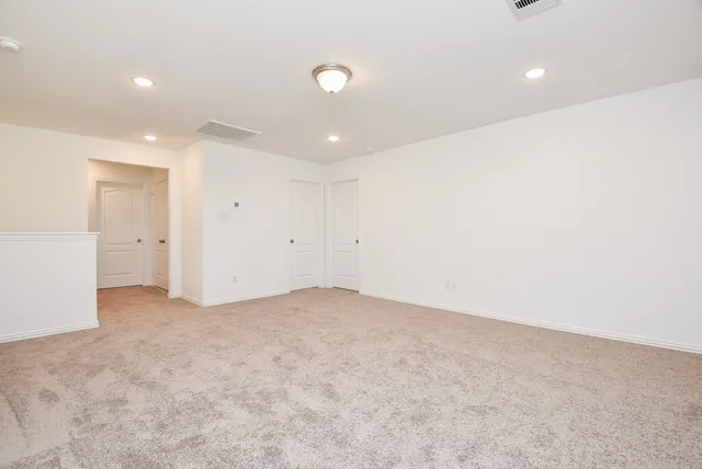 an empty room with an entryway