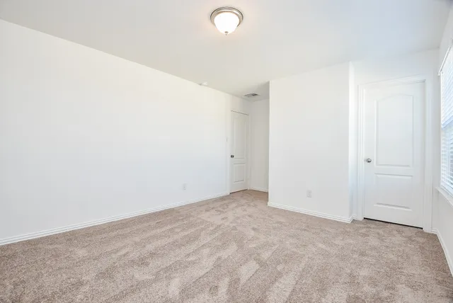 an empty room with an entryway