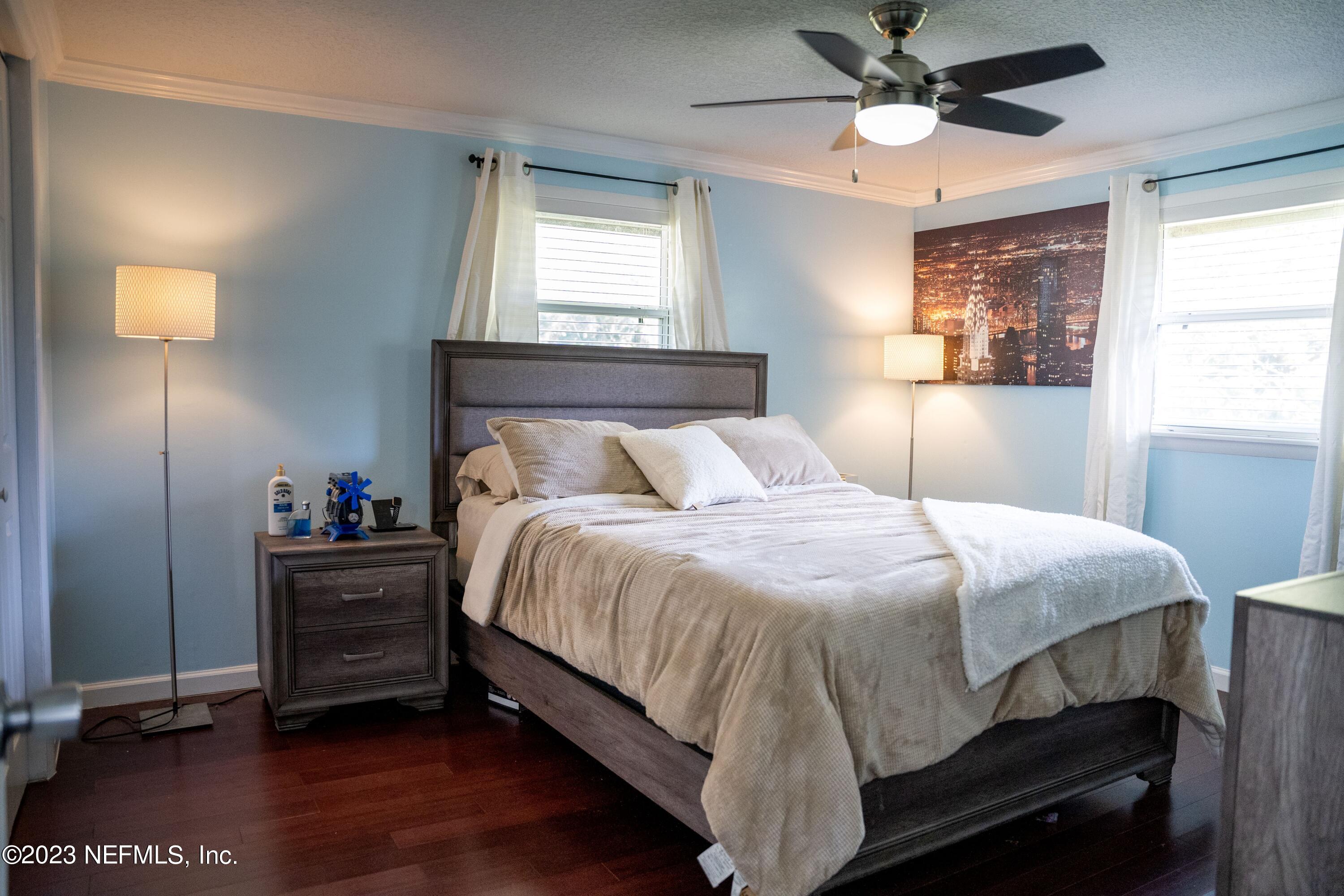 9008 Old Kings Road Jacksonville, FL 32219 - Photo 15 of 22 a bedroom with a bed and a window
