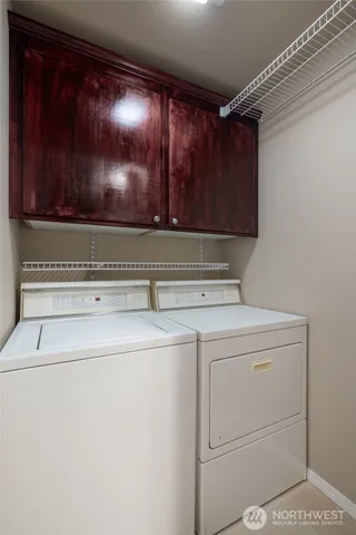 an aerial view of residential house with outdoor space and parking
