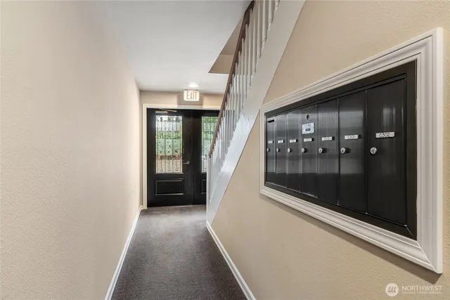 a view of gallery with windows