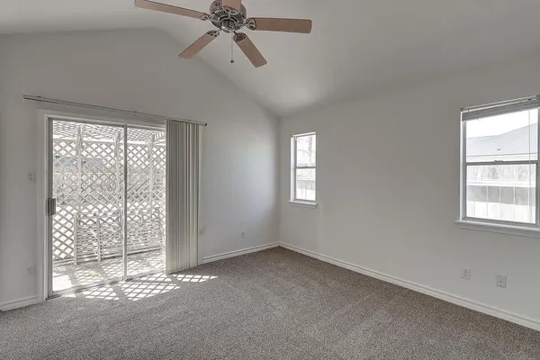 a view of empty room with windows