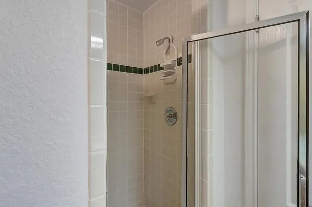 a bathroom with a sink a vanity and a mirror