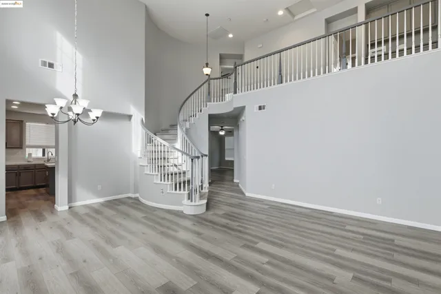 a view of a livingroom with wooden floor
