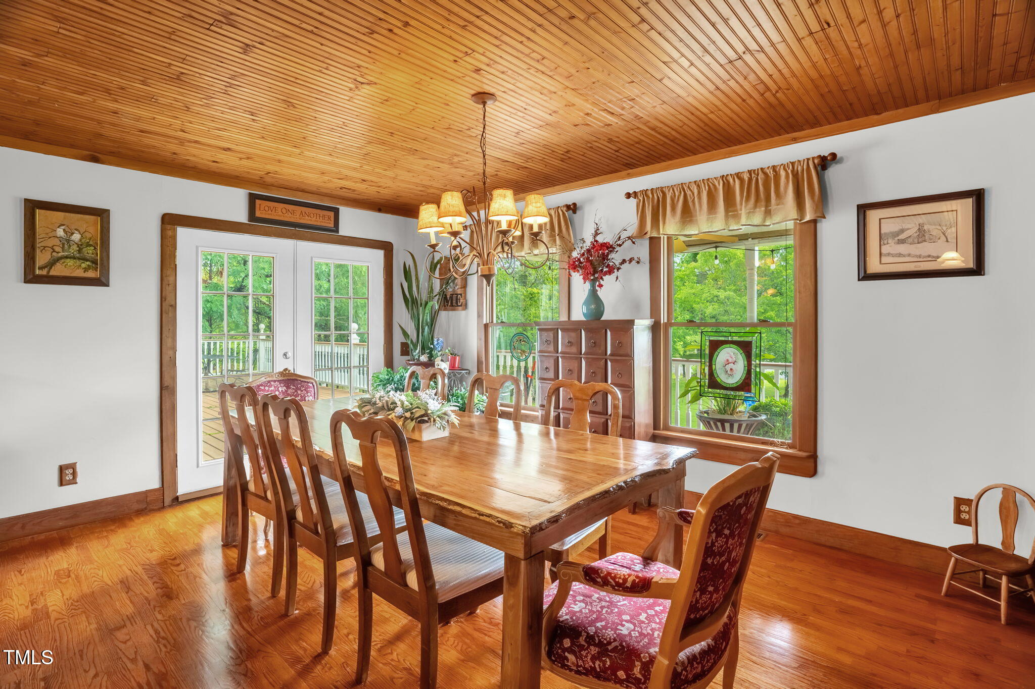 771 Cedar Grove Church Road Roxboro, NC 27574 - Photo 10 of 45 a view of a dining room with furniture window and outside view