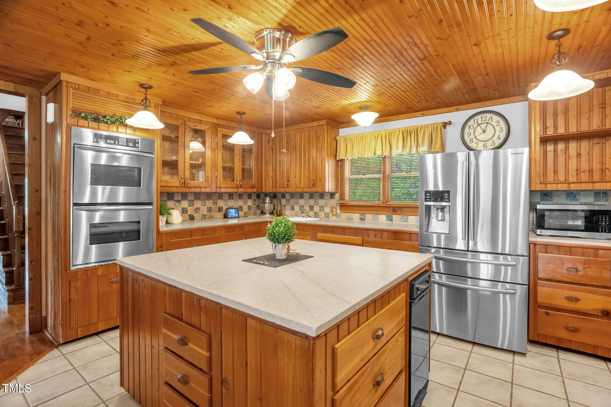 771 Cedar Grove Church Road Roxboro, NC 27574 - Photo 16 of 45 a kitchen with a refrigerator and a sink