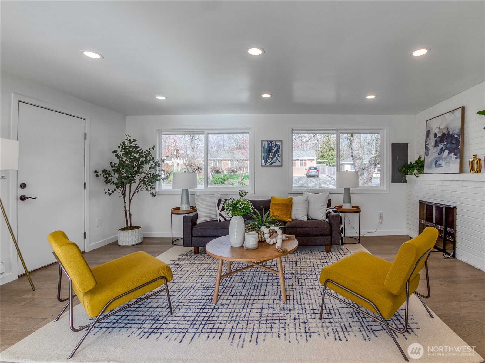 18 232nd Place Southwest Bothell, WA 98021 - Photo 11 of 32 a living room with furniture and a large window