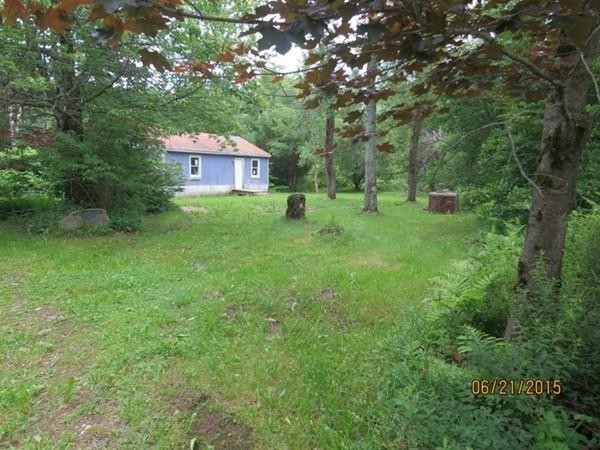 15 Curtin Road Peru, MA 01235 - Photo 1 of 11 a fire hydrant in the middle of a field