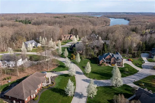 an aerial view of a town with couple of houses