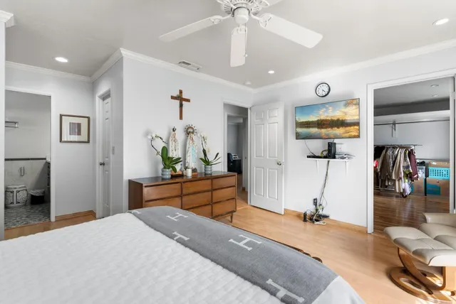 a room with furniture a rug and a window