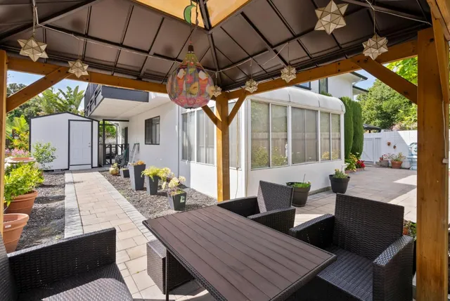 a front view of a house having garden