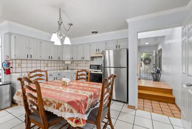 a view of a dining room with furniture