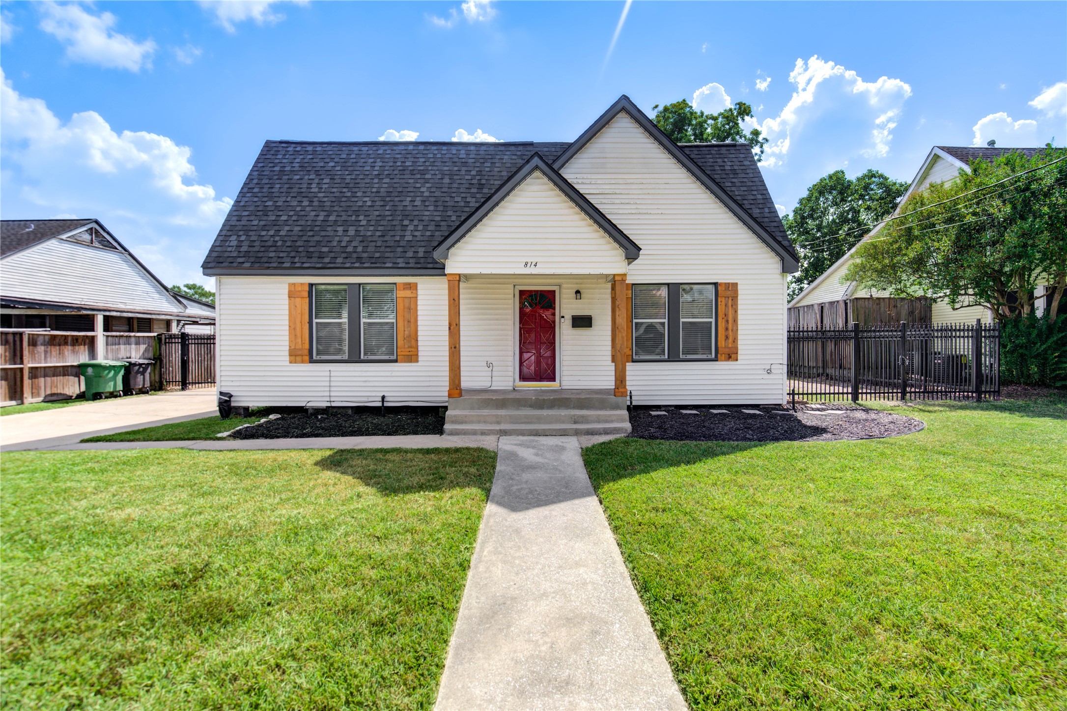 a front view of a house with yard