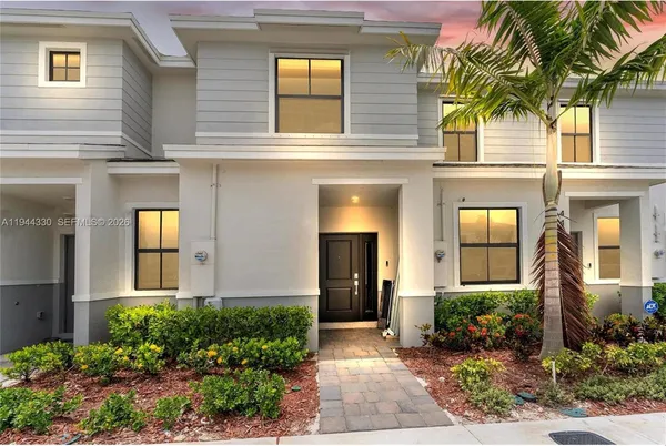 a front view of a house having yard