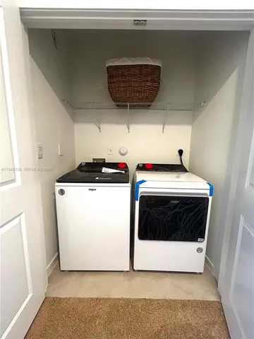 a utility room with a washer and dryer