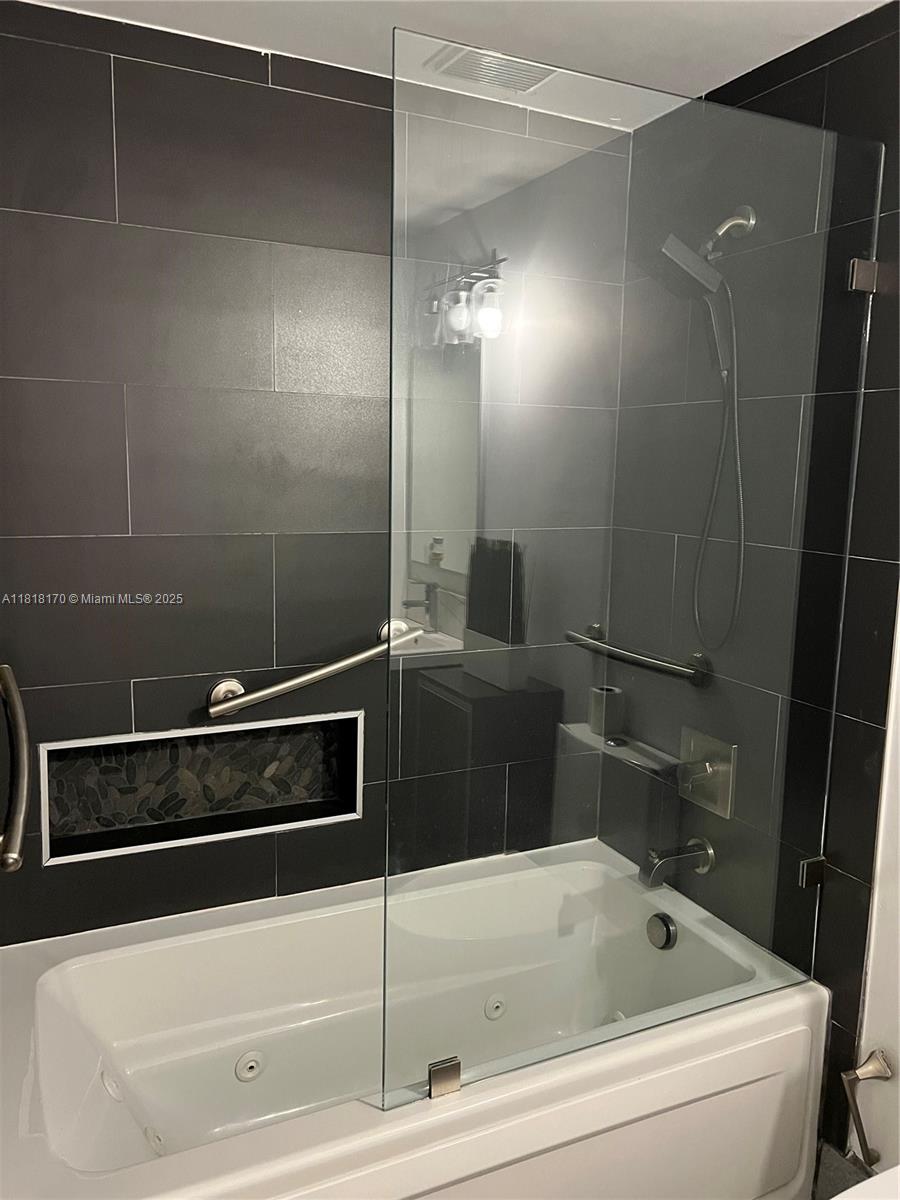 Flagami Miami, FL 33126 - Photo 8 of 8 a bathroom with a bathtub and shower