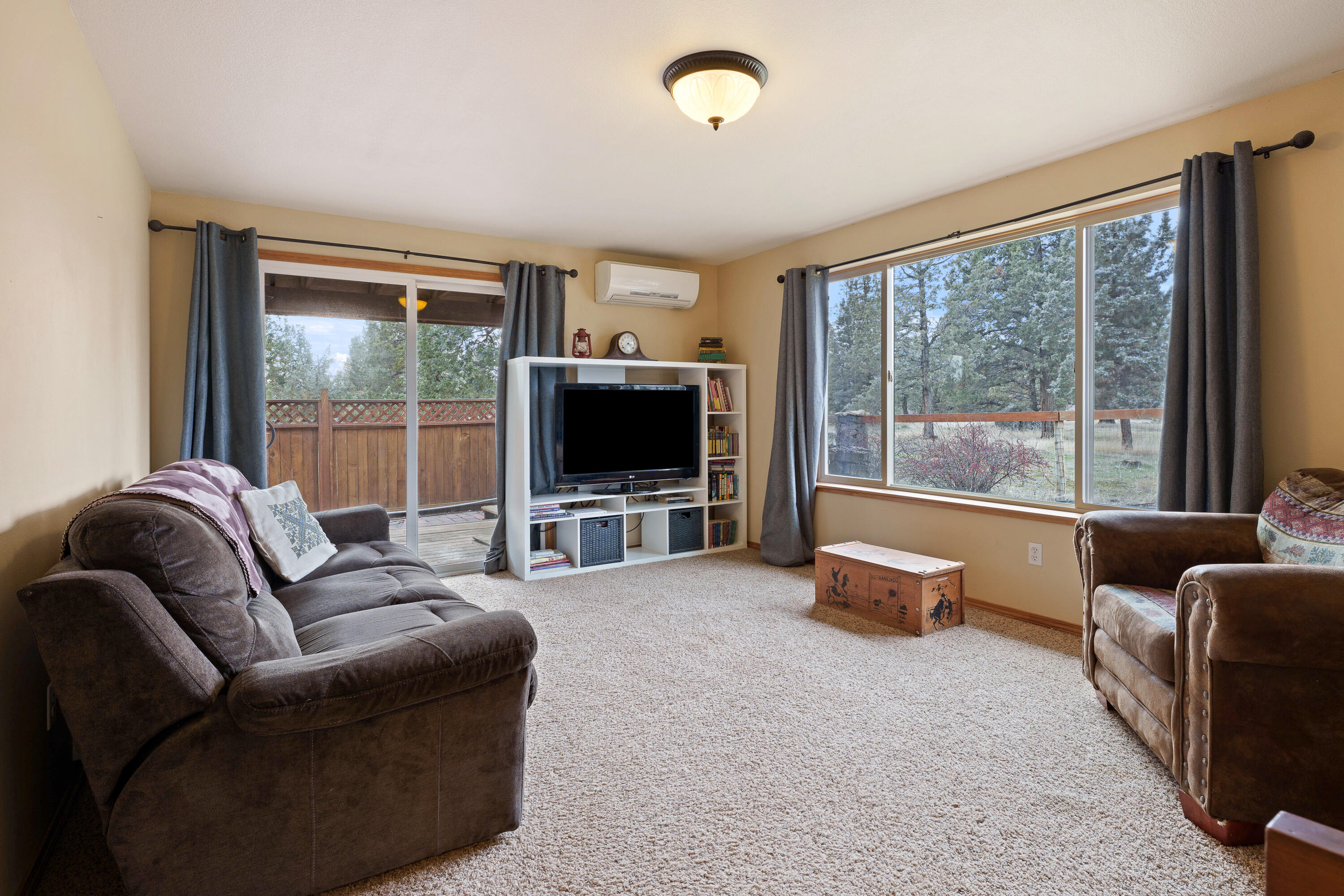 5871 Southwest Badger Road Terrebonne, OR 97760 - Photo 17 of 50 Downstairs Bonus Room with access to deck