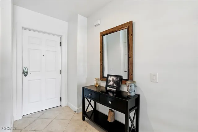 a room with a mirror and a sink