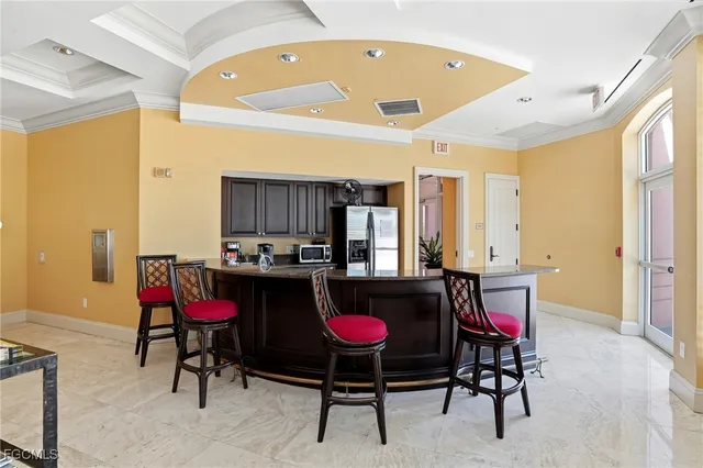 a view of a book shelf with lots of books