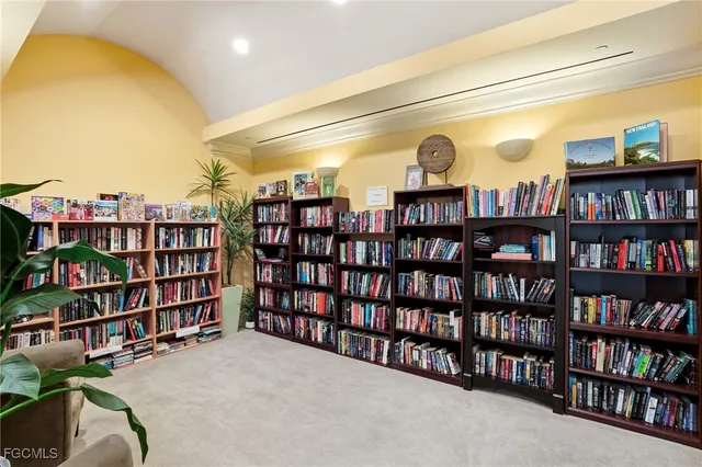 a room with gym equipment and a large window