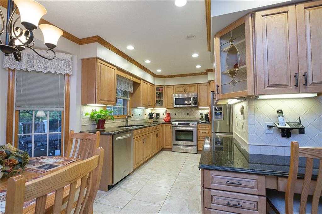 72 Midway Drive McKees Rocks, PA 15136 - Photo 5 of 25 a kitchen with cabinets and appliances