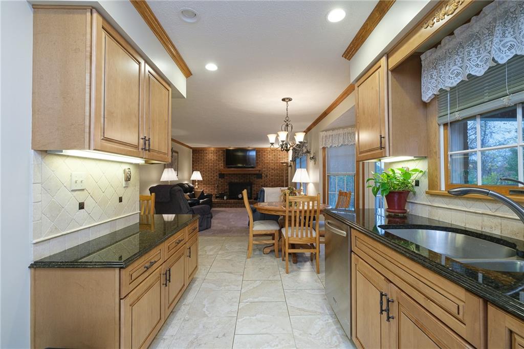 72 Midway Drive McKees Rocks, PA 15136 - Photo 8 of 25 a kitchen that has a lot of cabinets in it