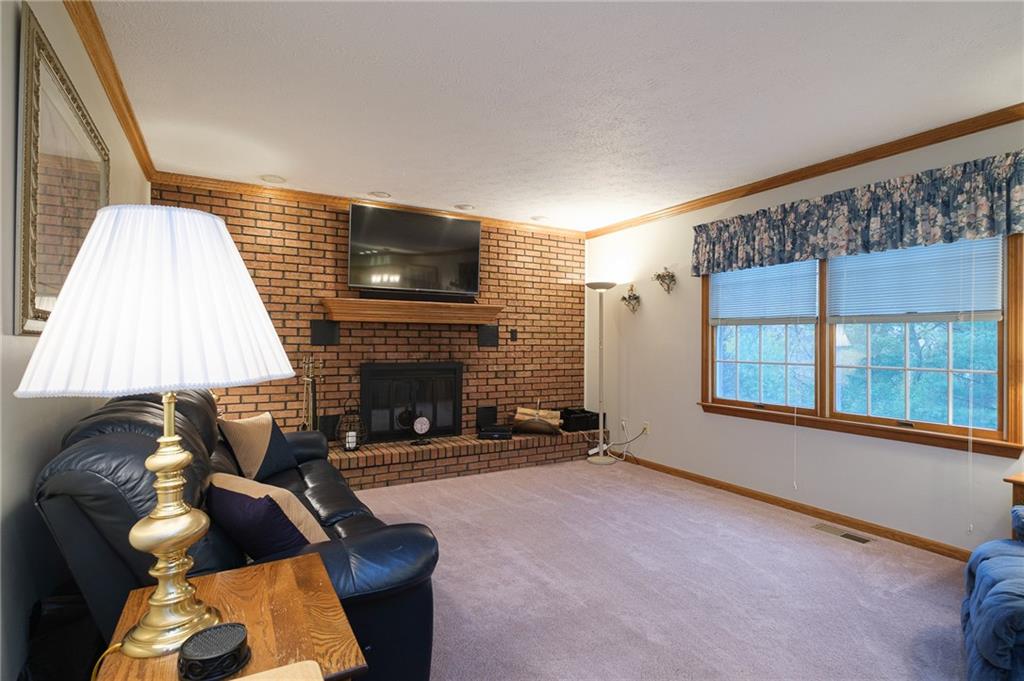 72 Midway Drive McKees Rocks, PA 15136 - Photo 9 of 25 a living room with furniture and a fireplace