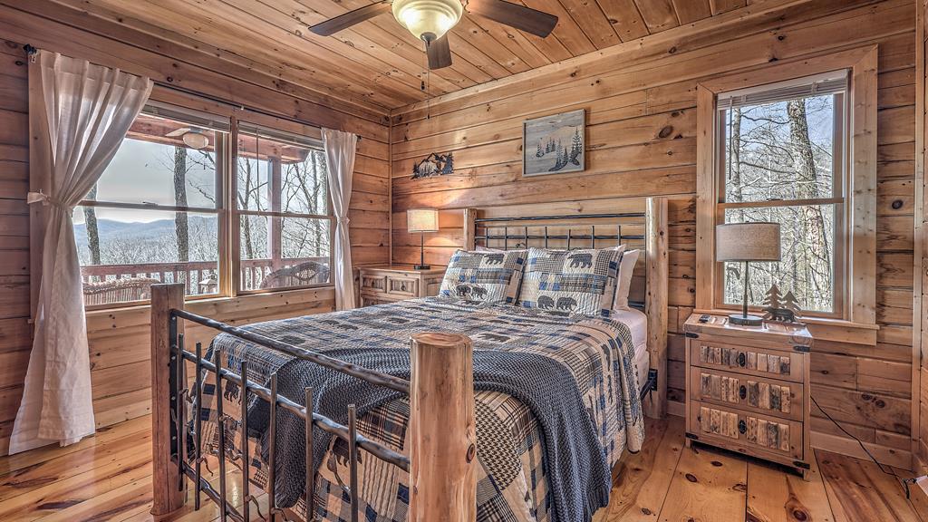 203 Chimney Rock Court Blue Ridge, GA 30513 - Photo 34 of 52 Secondary bedroom with queen bed and views