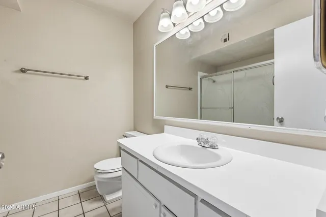 a view of hallway with closet area