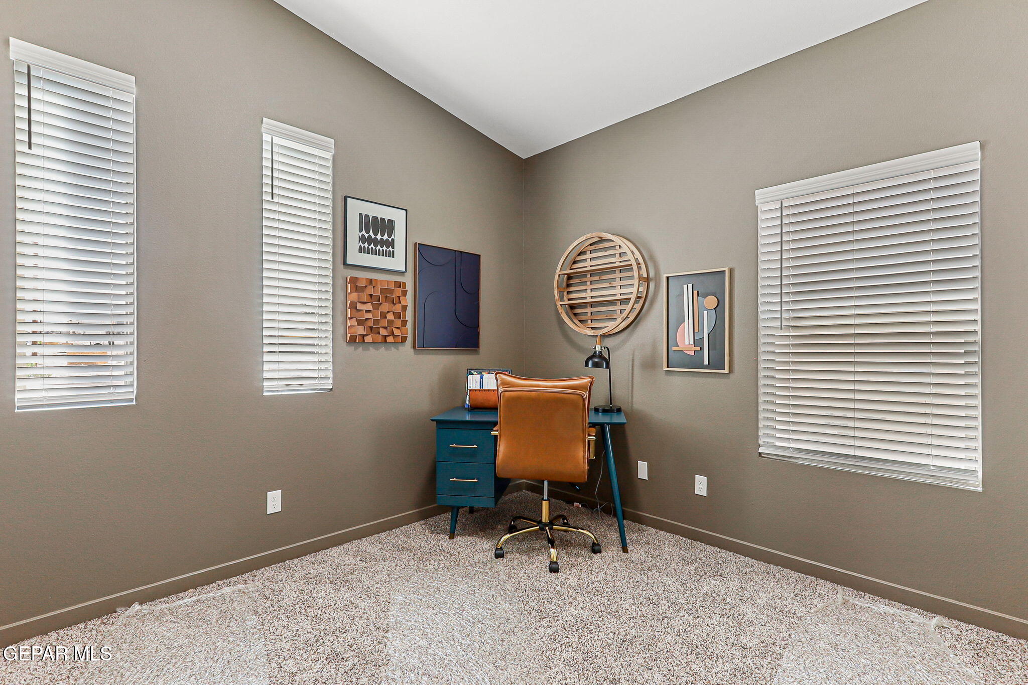 605 Espa Court Vinton, TX 79821 - Photo 16 of 31 a workspace with furniture and a window