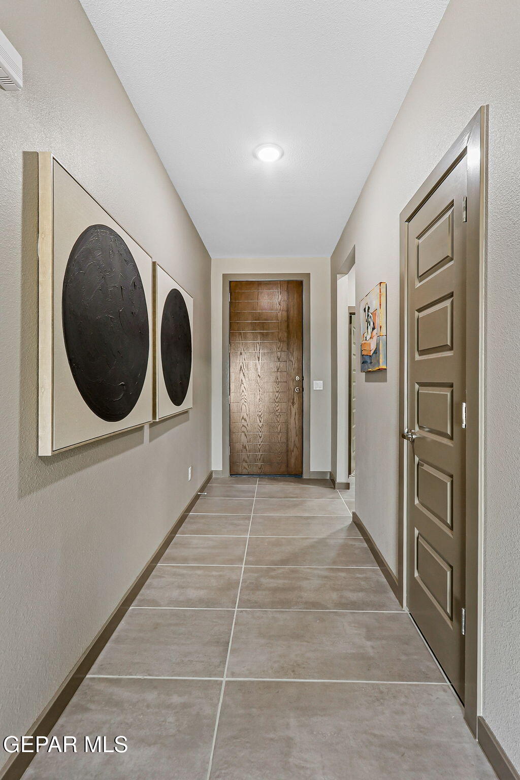 605 Espa Court Vinton, TX 79821 - Photo 2 of 31 a view of a hallway with washer and dryer