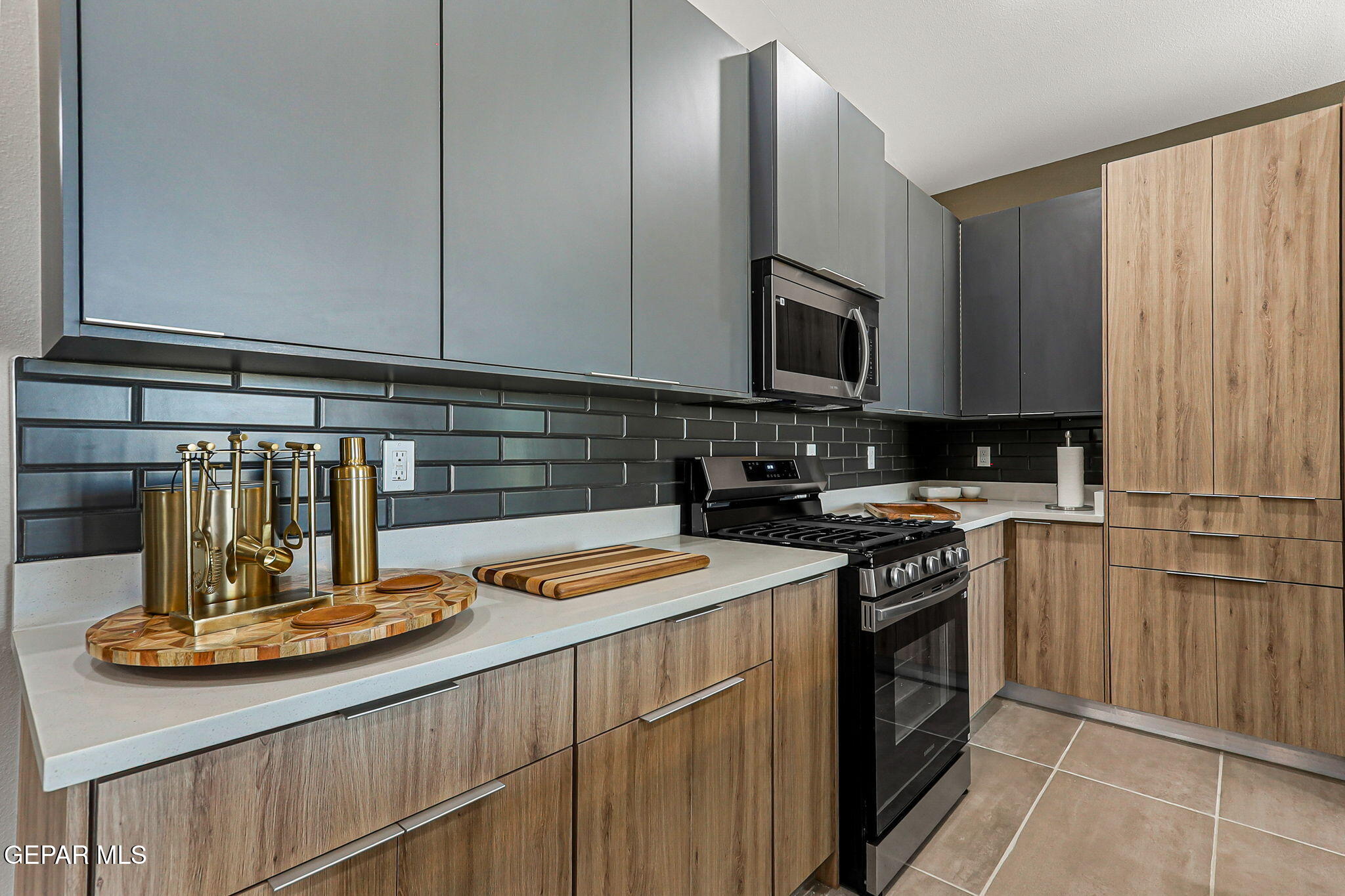 605 Espa Court Vinton, TX 79821 - Photo 3 of 31 a kitchen with a sink stove and cabinets