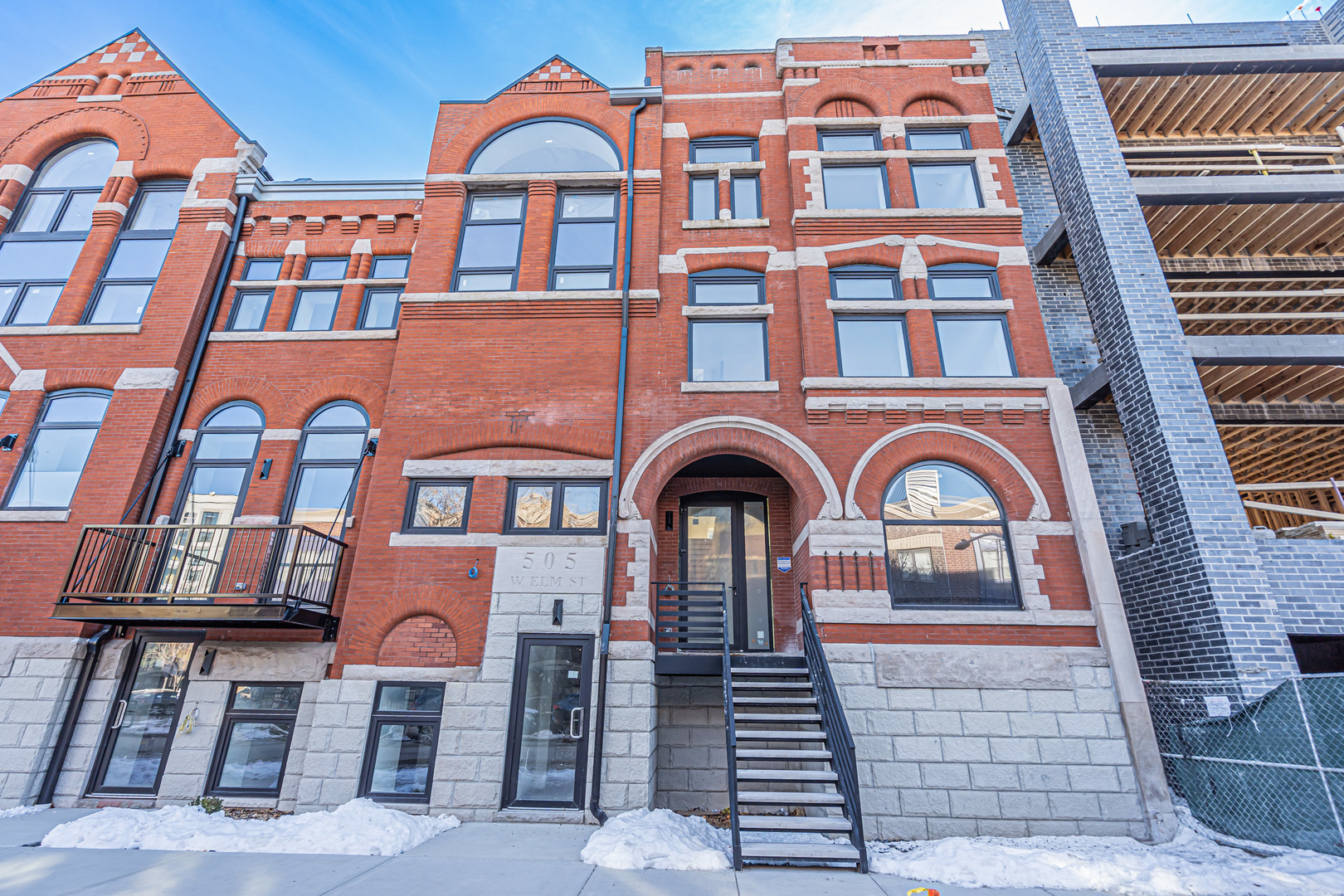 a front view of a multi story residential apartment building