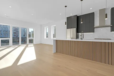 a open kitchen with a large window