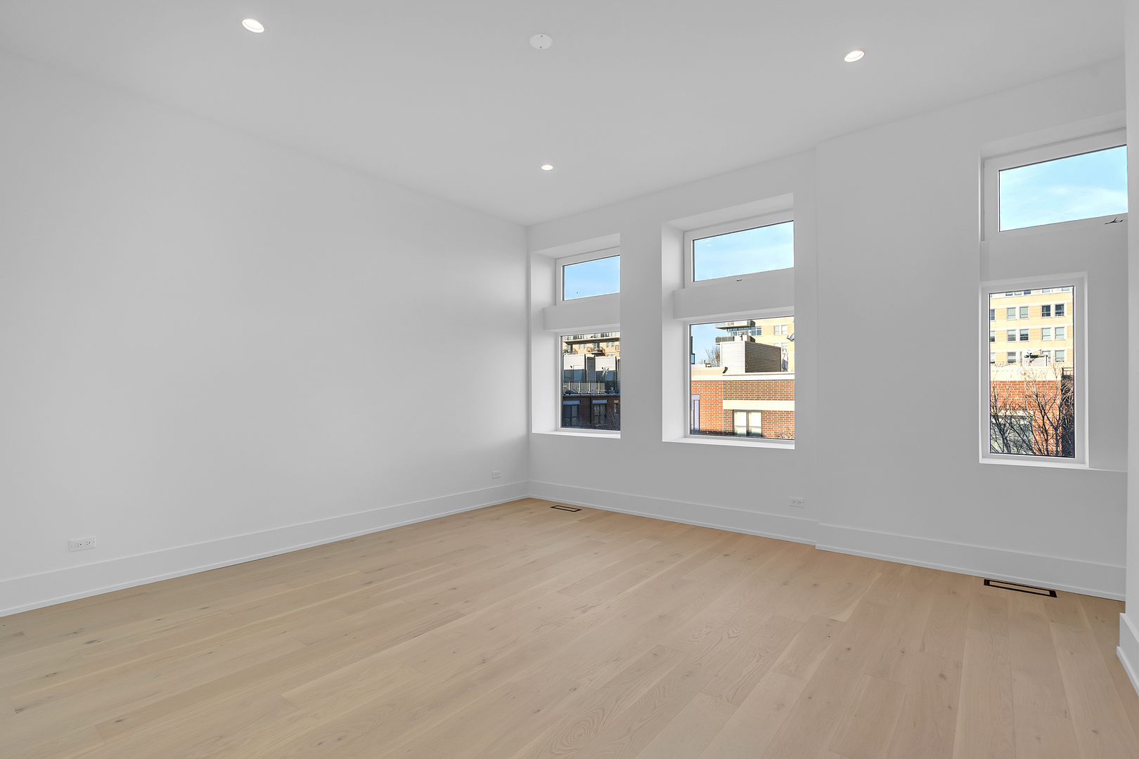 505 West Elm Street, Unit 7 Chicago, IL 60610 - Photo 25 of 36 an empty room with windows