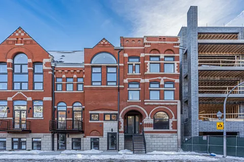 a front view of multi story residential apartment building