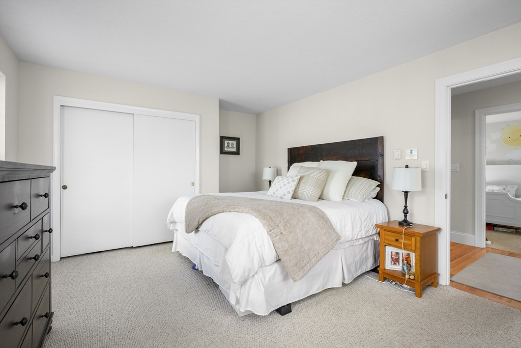 231 Route 28, Unit 20 Harwich, MA 02671 - Photo 13 of 22 a bedroom with a bed and a window