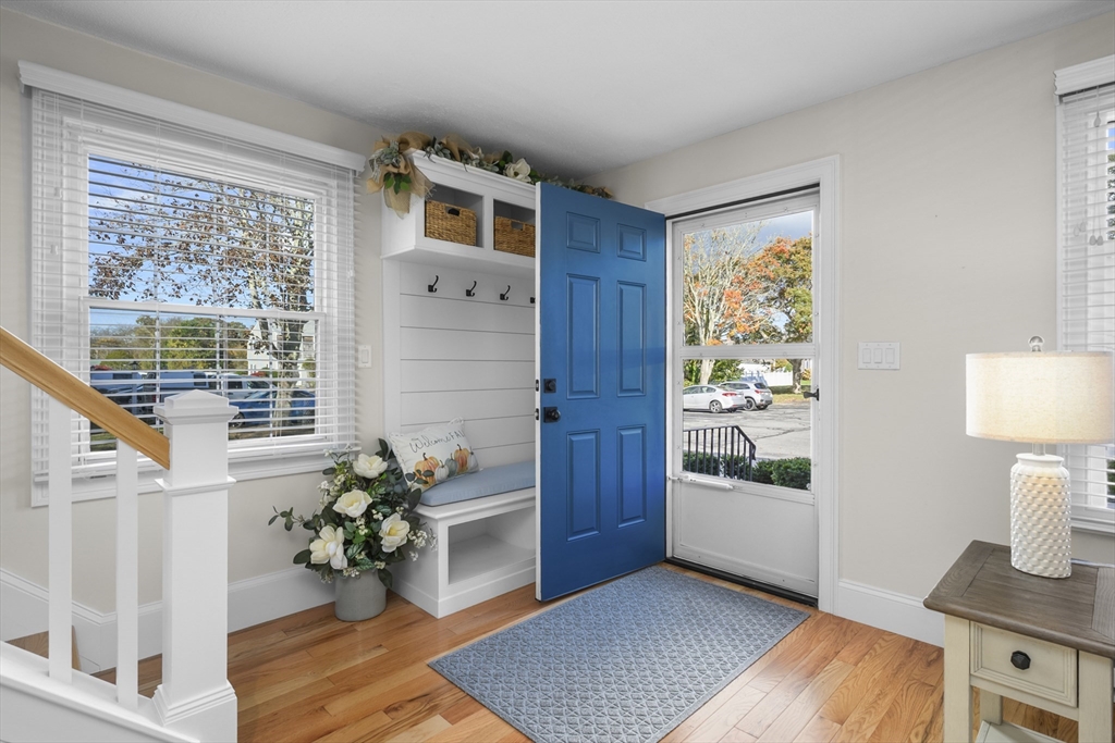 231 Route 28, Unit 20 Harwich, MA 02671 - Photo 2 of 22 a living room with furniture and a potted plant